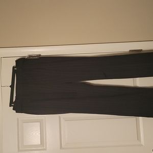 Limited pinstripe pants, with belt and cuffs.